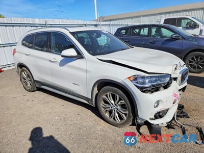 Czwarte zdjęcie samochodu z boku: 2016 BMW X1 XDRIVE28I VIN:WBXHT3C36GP887478 - miniatura