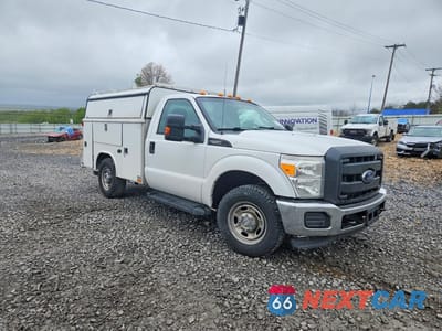 Czwarte zdjęcie samochodu z boku: 2014 FORD F250 SUPER DUTY VIN:1FTBF2A66EEA37232 - miniatura