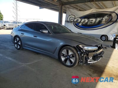 Czwarte zdjęcie samochodu z boku: 2024 BMW I4 EDRIVE 35 VIN:WBY43AW0XRFR69982 - miniatura