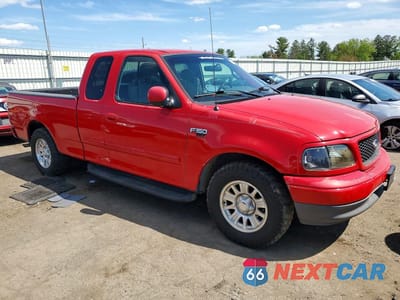 Czwarte zdjęcie samochodu z boku: 2002 FORD F150 VIN:1FTRX17212NA85839 - miniatura