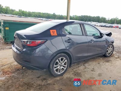Trzecie zdjęcie samochodu z tyłu: 2017 TOYOTA YARIS IA BASE VIN:3MYDLBYV3HY186754 - miniatura