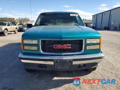 Piąte zdjęcie samochodu w środku: 1995 GMC SIERRA K1500 VIN:2GTEK19K8S1544618 - miniatura