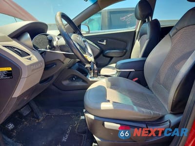 Zdjęcie 7 z 12 samochodu: 2012 HYUNDAI TUCSON GLS VIN:KM8JUCAC4CU534775 - miniatura