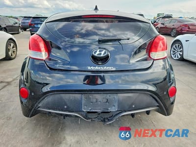 Zdjęcie 6 z 12 samochodu: 2013 HYUNDAI VELOSTER BASE VIN:KMHTC6AD0DU107262 - miniatura