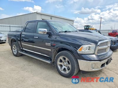 Czwarte zdjęcie samochodu z boku: 2016 RAM 1500 LARAMIE VIN:1C6RR7NMXGS303617 - miniatura