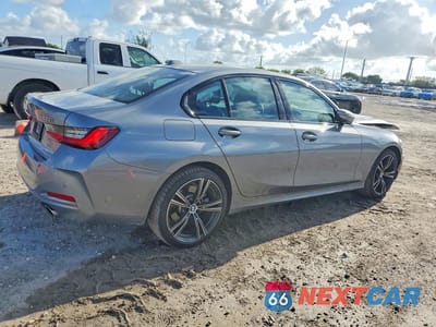 Trzecie zdjęcie samochodu z tyłu: 2023 BMW 330XI VIN:3MW89FF02P8D04365 - miniatura