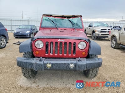 Piąte zdjęcie samochodu w środku: 2011 JEEP WRANGLER UNLIMITED SPORT VIN:1J4BA3H14BL567344 - miniatura
