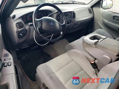 Zdjęcie 8 z 12 samochodu: 2002 FORD F150 VIN:2FTRX18W52CA91084 - miniatura
