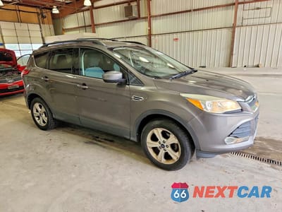 Czwarte zdjęcie samochodu z boku: 2013 FORD ESCAPE SE VIN:1FMCU0GX2DUD08026 - miniatura