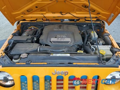 Zdjęcie 11 z 12 samochodu: 2012 JEEP WRANGLER UNLIMITED SPORT VIN:1C4BJWDG7CL120428 - miniatura