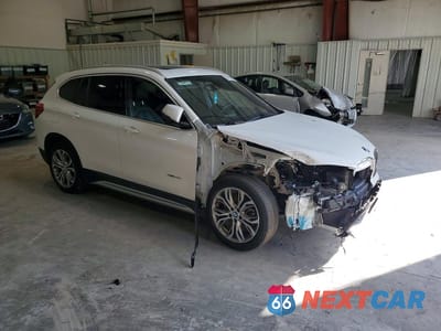 Czwarte zdjęcie samochodu z boku: 2016 BMW X1 XDRIVE28I VIN:WBXHT3C31G5E48462 - miniatura