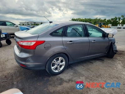 Trzecie zdjęcie samochodu z tyłu: 2013 FORD FOCUS SE VIN:1FADP3F21DL305704 - miniatura
