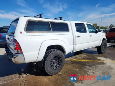 Trzecie zdjęcie samochodu z tyłu: 2012 TOYOTA TACOMA DOUBLE CAB LONG BED VIN:3TMMU4FN9CM041292 - miniatura