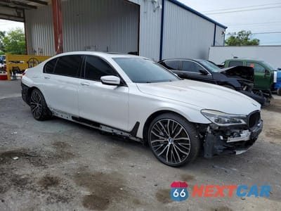 Czwarte zdjęcie samochodu z boku: 2019 BMW 750 I VIN:WBA7F0C55KGM24902 - miniatura