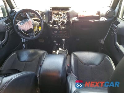 Zdjęcie 8 z 13 samochodu: 2016 JEEP WRANGLER UNLIMITED SAHARA VIN:1C4BJWEGXGL173130 - miniatura