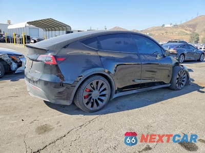 Trzecie zdjęcie samochodu z tyłu: 2022 TESLA MODEL Y VIN:7SAYGDEF7NF407781 - miniatura