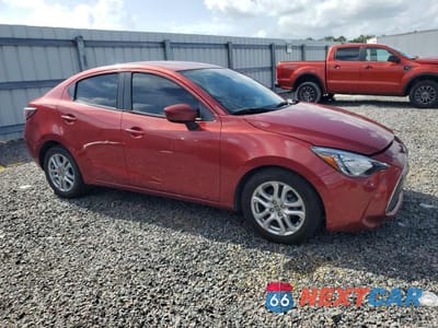Czwarte zdjęcie samochodu z boku: 2016 SCION IA BASE VIN:3MYDLBZV4GY113325 - miniatura