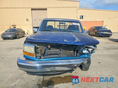 Piąte zdjęcie samochodu w środku: 1995 FORD F150 VIN:1FTEX15N6SKB89319 - miniatura