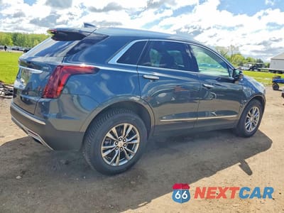 Trzecie zdjęcie samochodu z tyłu: 2021 CADILLAC XT5 PREMIUM LUXURY VIN:1GYKNDRS9MZ165594 - miniatura