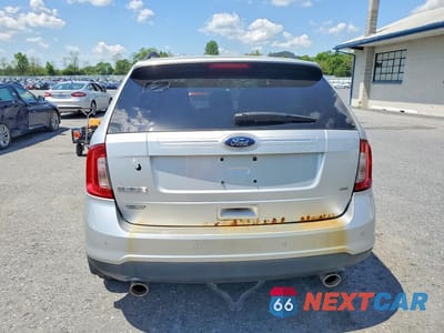 Zdjęcie 6 z 13 samochodu: 2013 FORD EDGE SE VIN:2FMDK4GC1DBA85899 - miniatura