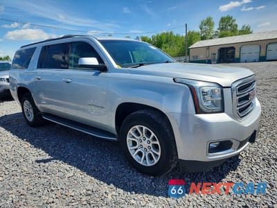 Czwarte zdjęcie samochodu z boku: 2016 GMC YUKON XL K1500 SLE VIN:1GKS2FKC4GR187959 - miniatura