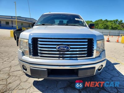 Piąte zdjęcie samochodu w środku: 2011 FORD F150 SUPERCREW VIN:1FTFW1CF3BFC77448 - miniatura