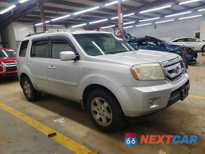 Czwarte zdjęcie samochodu z boku: 2009 HONDA PILOT VIN:5FNYF48999B002436 - miniatura