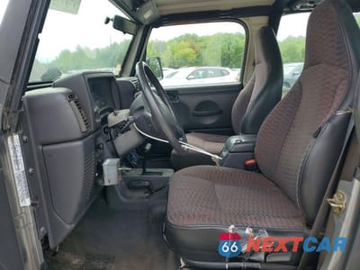 Zdjęcie 7 z 12 samochodu: 2000 JEEP WRANGLER / TJ SPORT VIN:1J4FA49S2YP754758 - miniatura