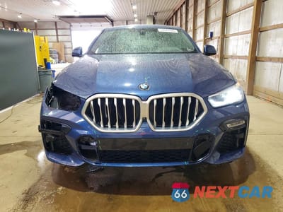 Piąte zdjęcie samochodu w środku: 2021 BMW X6 XDRIVE40I VIN:5UXCY6C04M9G69704 - miniatura