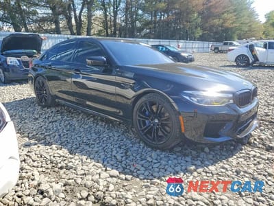 Czwarte zdjęcie samochodu z boku: 2019 BMW M5 VIN:WBSJF0C58KB285914 - miniatura