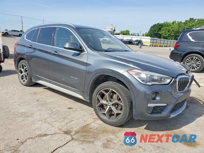 Czwarte zdjęcie samochodu z boku: 2018 BMW X1 VIN:WBXHT3C3XJ5K26023 - miniatura