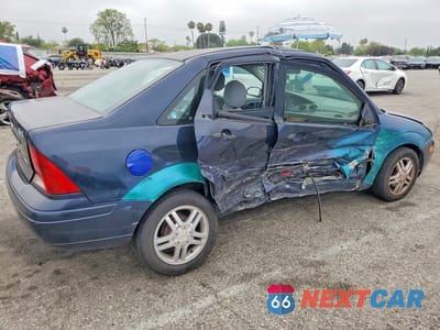Trzecie zdjęcie samochodu z tyłu: 2003 FORD FOCUS SE COMFORT VIN:1FAFP34Z23W320525 - miniatura