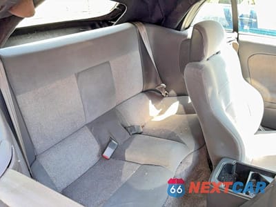 Zdjęcie 6 z 10 samochodu: 1996 MITSUBISHI ECLIPSE SPYDER GS VIN:4A3AX35G7TE410564 - miniatura