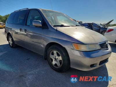 Czwarte zdjęcie samochodu z boku: 2000 HONDA ODYSSEY EX VIN:2HKRL1868YH013784 - miniatura