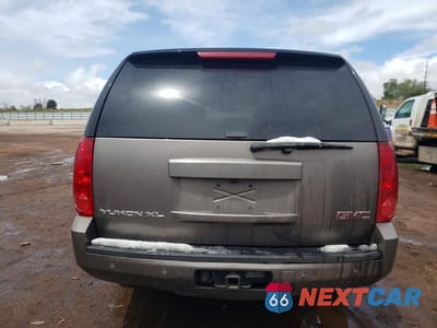 Zdjęcie 6 z 13 samochodu: 2013 GMC YUKON XL K1500 SLT VIN:1GKS2KE7XDR303782 - miniatura
