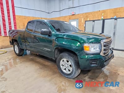 Czwarte zdjęcie samochodu z boku: 2015 GMC CANYON VIN:1GTH6AEA3F1215075 - miniatura