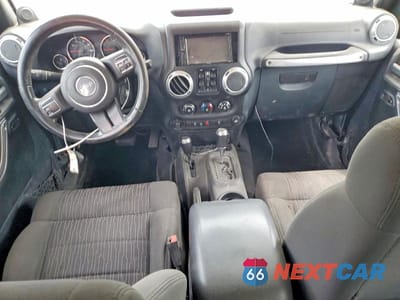 Zdjęcie 8 z 13 samochodu: 2011 JEEP WRANGLER UNLIMITED SAHARA VIN:1J4BA5H15BL532579 - miniatura