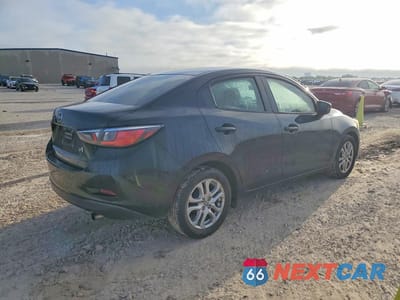 Trzecie zdjęcie samochodu z tyłu: 2016 SCION IA BASE VIN:3MYDLBZV0GY108607 - miniatura