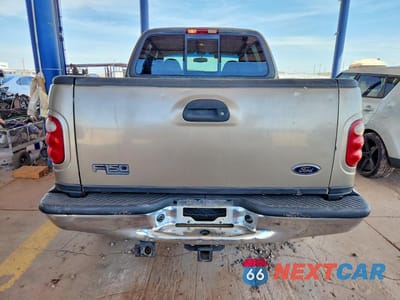 Zdjęcie 6 z 12 samochodu: 2001 FORD F-150 VIN:1FTRW08L91KA08608 - miniatura