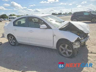 Czwarte zdjęcie samochodu z boku: 2006 MAZDA 3 I VIN:JM1BK12F861443106 - miniatura