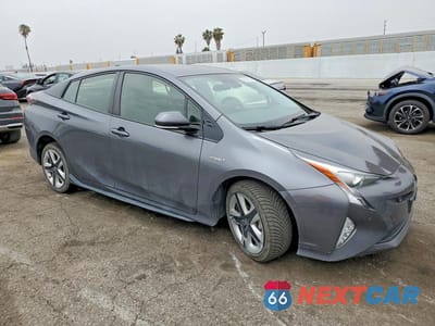 Czwarte zdjęcie samochodu z boku: 2017 TOYOTA PRIUS THREE TOURING VIN:JTDKARFUXH3048331 - miniatura