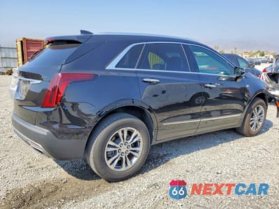 Trzecie zdjęcie samochodu z tyłu: 2020 CADILLAC XT5 PREMIUM LUXURY VIN:1GYKNCRS7LZ211156 - miniatura
