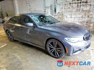 Czwarte zdjęcie samochodu z boku: 2021 BMW 330I VIN:3MW5R1J00M8B91668 - miniatura
