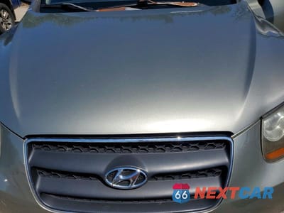 Zdjęcie 12 z 13 samochodu: 2007 HYUNDAI SANTA FE SE VIN:5NMSH13E87H029951 - miniatura
