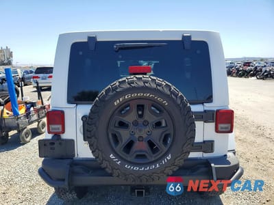 Zdjęcie 6 z 13 samochodu: 2016 JEEP WRANGLER UNLIMITED SAHARA VIN:1C4BJWEGXGL173130 - miniatura
