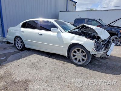 Czwarte zdjęcie samochodu z boku: 2002 INFINITI Q45 BASE VIN:JNKBF01A92M006999 - miniatura