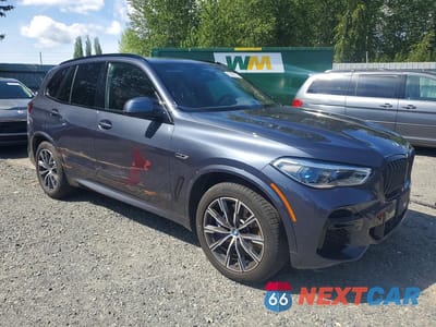 Czwarte zdjęcie samochodu z boku: 2022 BMW X5 XDRIVE45E VIN:5UXTA6C01N9J32937 - miniatura