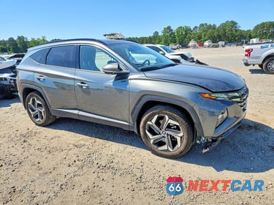 Czwarte zdjęcie samochodu z boku: 2022 HYUNDAI TUCSON LIMITED VIN:5NMJECAE9NH139262 - miniatura