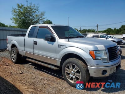 Czwarte zdjęcie samochodu z boku: 2014 FORD F150 SUPER CAB VIN:1FTFX1EFXEFB41705 - miniatura