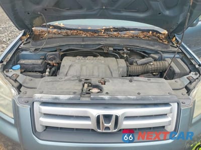 Zdjęcie 12 z 13 samochodu: 2006 HONDA PILOT EX VIN:2HKYF18636H519488 - miniatura